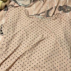 Pink shirt with black little hearts